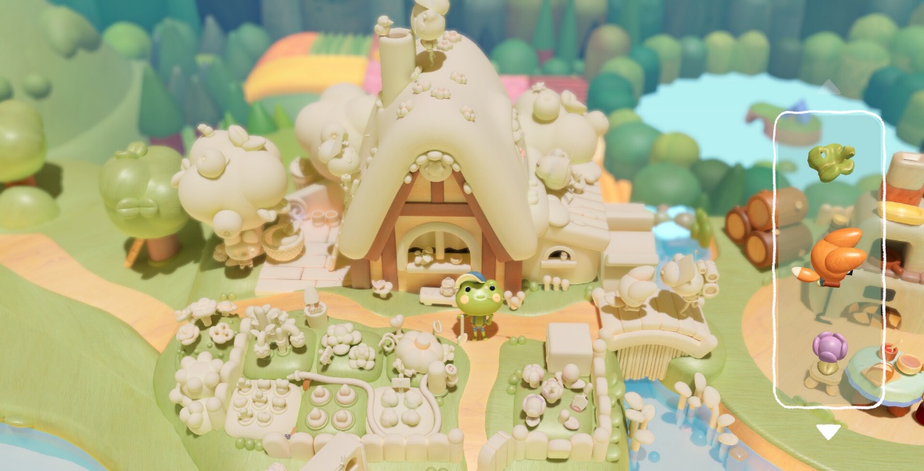 Ben junto a una casa de madera, con piezas pendientes de encajar en el diorama
